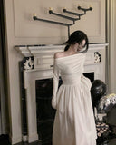 French Word Shoulder Long Sleeve White Dress Texture High Sense 2026 New Early Autumn Temperament Long Dress